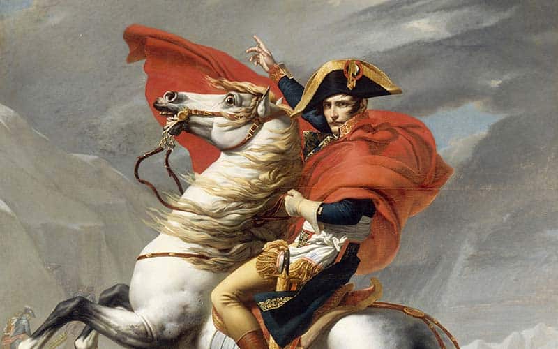 Napoleon Bonaparte beim Überschreiten der Alpen am Großen Sankt Bernhard | Jacques-Louis David, Schloss Versailles, Public domain, via Wikimedia Commons